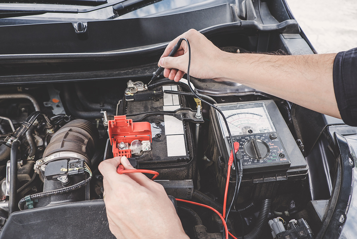 Vehicle maintenance being performed to ensure safe driving.
